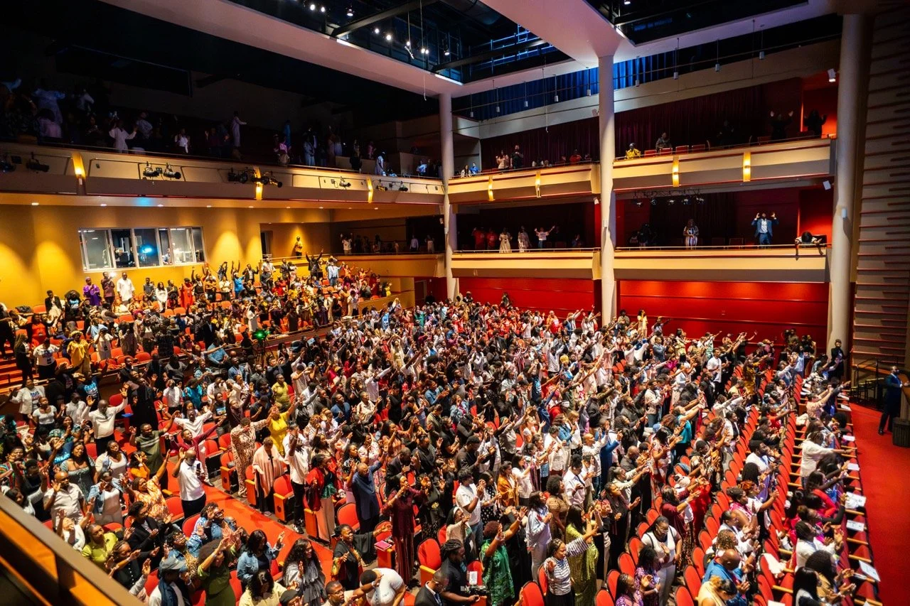 Congregation worshipping at Camp Meeting 2025 church conference